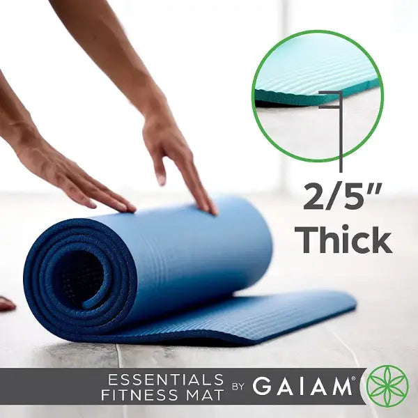 Blue fitness mat being unrolled with a close-up of thickness and Gaiam branding.