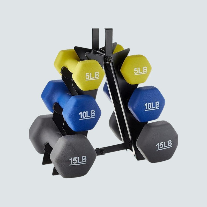 Set of dumbbells with weight markings on a light gray background