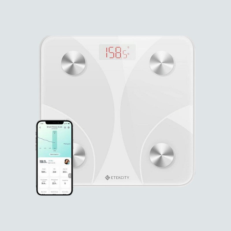 Digital body fat scale with smartphone app on a light gray background