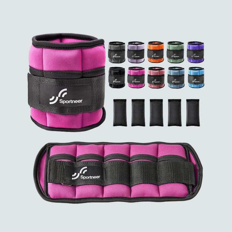 Pink ankle and wrist weights with black straps and Sportneer branding on a light gray background.