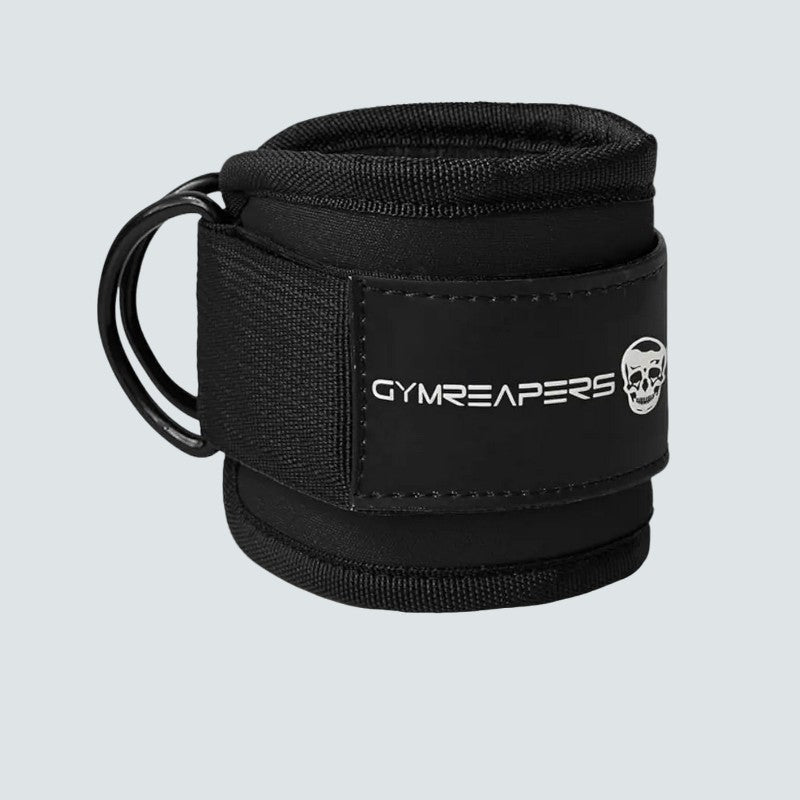 Black wrist wrap with 'GYMREAPERS' logo on a light gray background