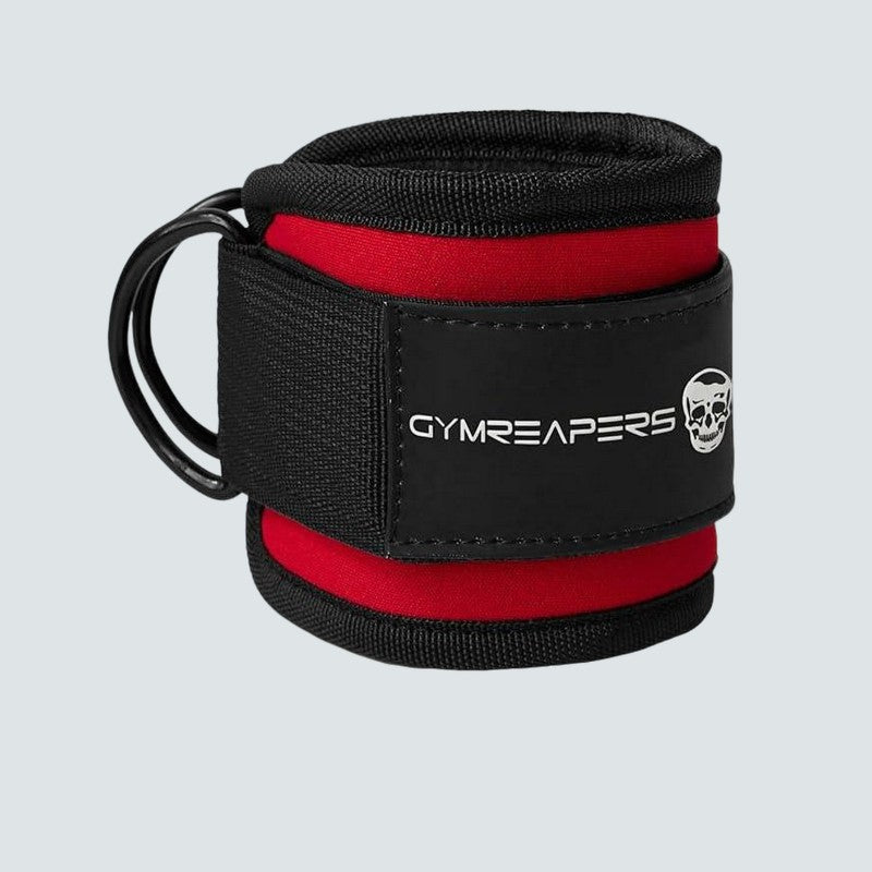 Black and red wrist wrap with 'GYMREAPERS' branding on a light gray background