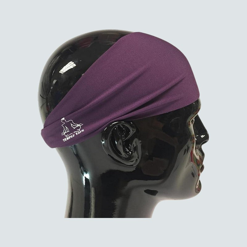Purple headband on a black mannequin head with a gray background