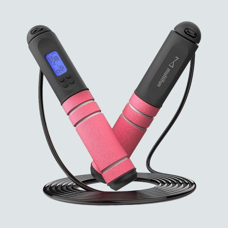Pink and black with digital display on a light gray background