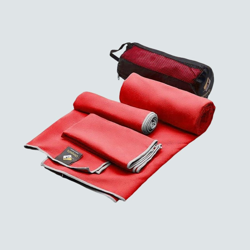 Red cooling towel set with black pouch on a light gray background